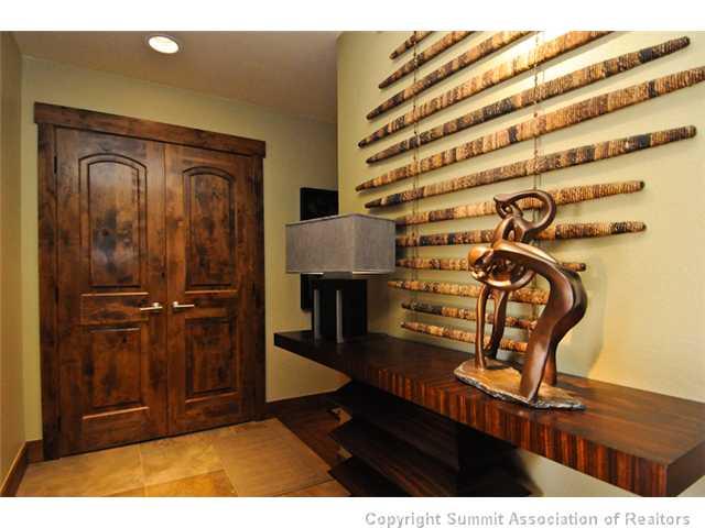 487 Main Street, Unit D Frisco, CO 80443 - Photo 18 of 25 a view of a livingroom with furniture and staircase