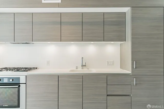 a bathroom with a double vanity sink and mirror