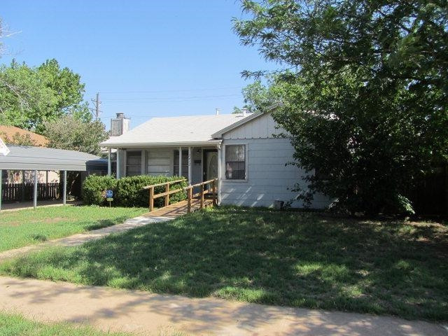 2412 36th Street Lubbock, TX 79412 - Photo 6 of 10 a view of a house with backyard porch and garden