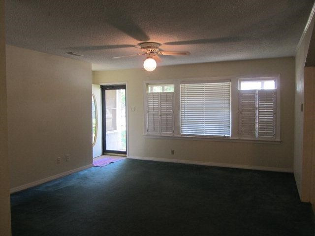 2412 36th Street Lubbock, TX 79412 - Photo 8 of 10 a view of an empty room with a window