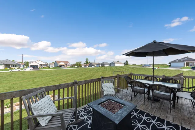 a view of a chairs and table in the terrace