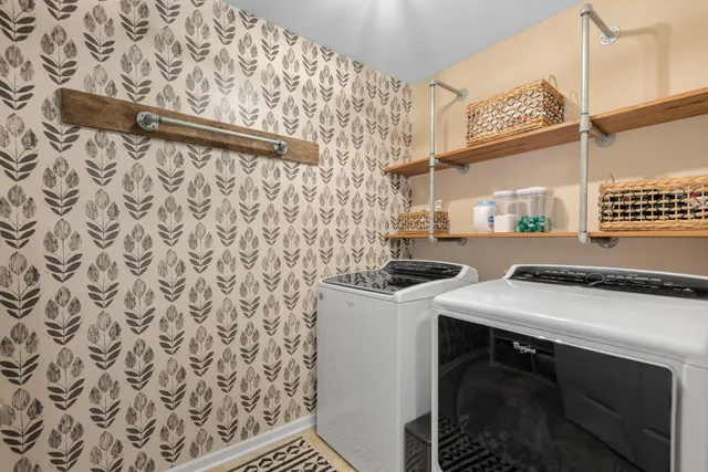 a utility room with dryer and washer