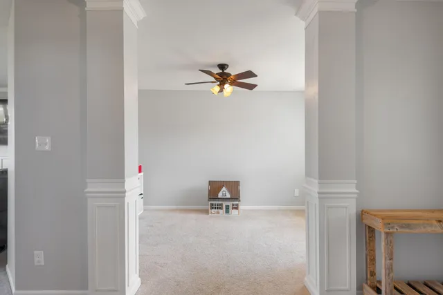 a view of workspace with a ceiling fan