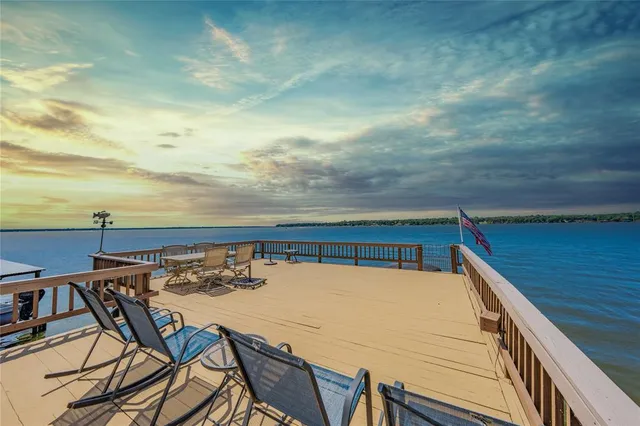 a view of a balcony with furniture
