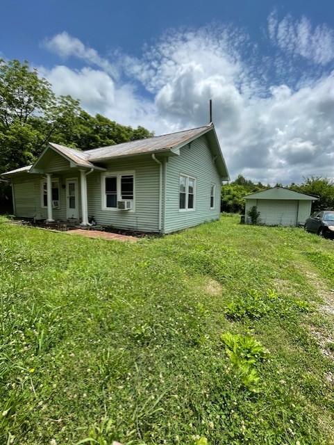 2034 Tennessee Street Westpoint, TN 38486 - Photo 2 of 9 a view of a house with a yard