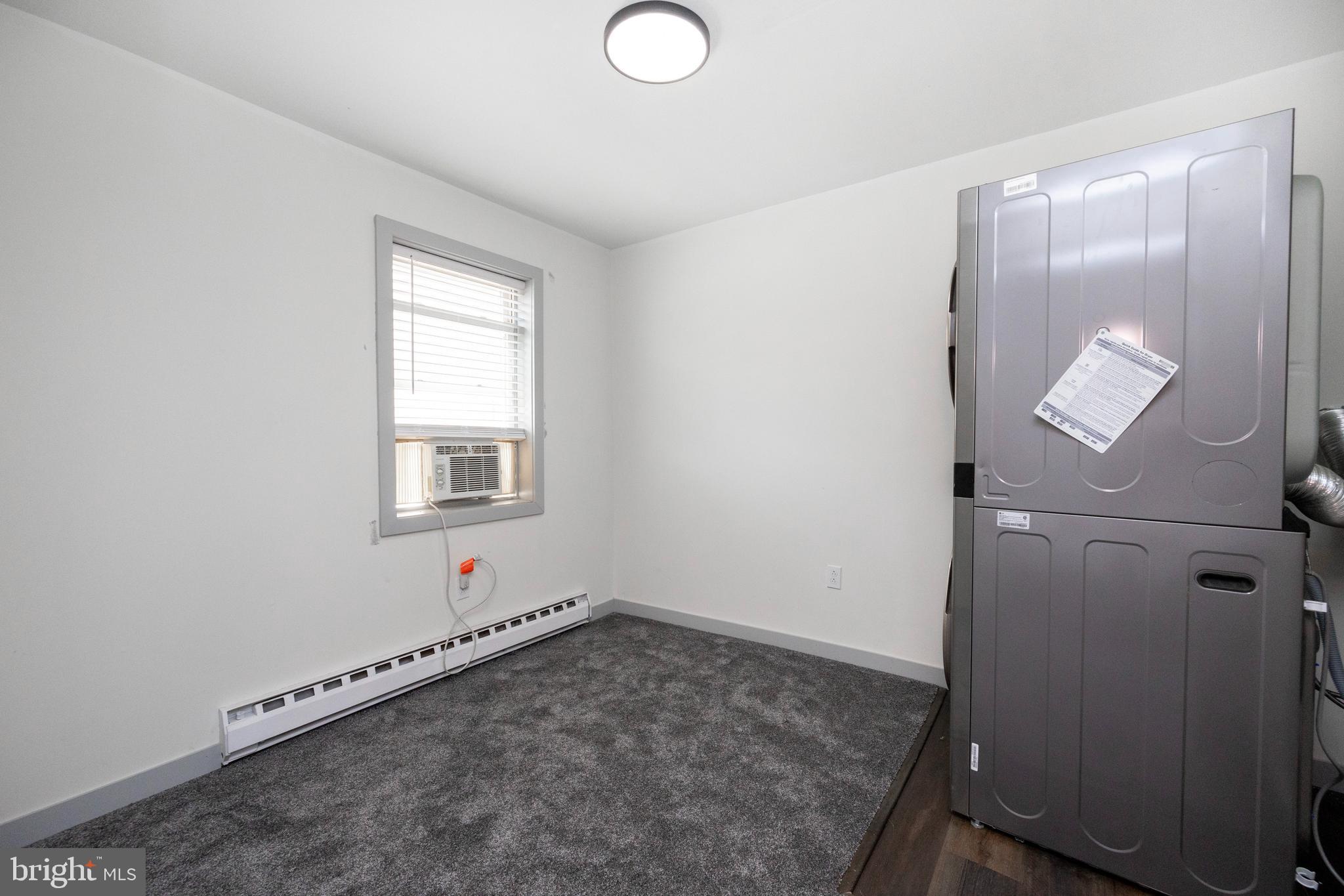 58 East 4th Street, Unit 2 Bridgeport, PA 19405 - Photo 12 of 28 an empty room with windows