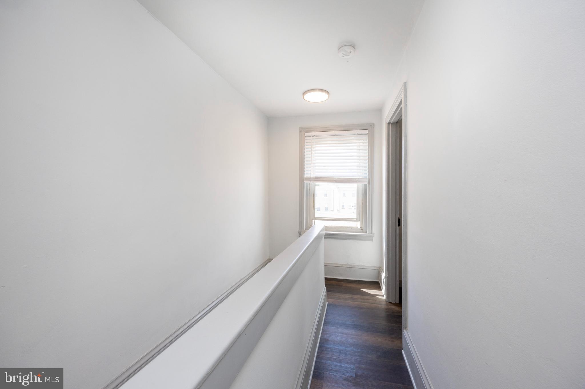 58 East 4th Street, Unit 2 Bridgeport, PA 19405 - Photo 15 of 28 a view of hallway with wooden floor