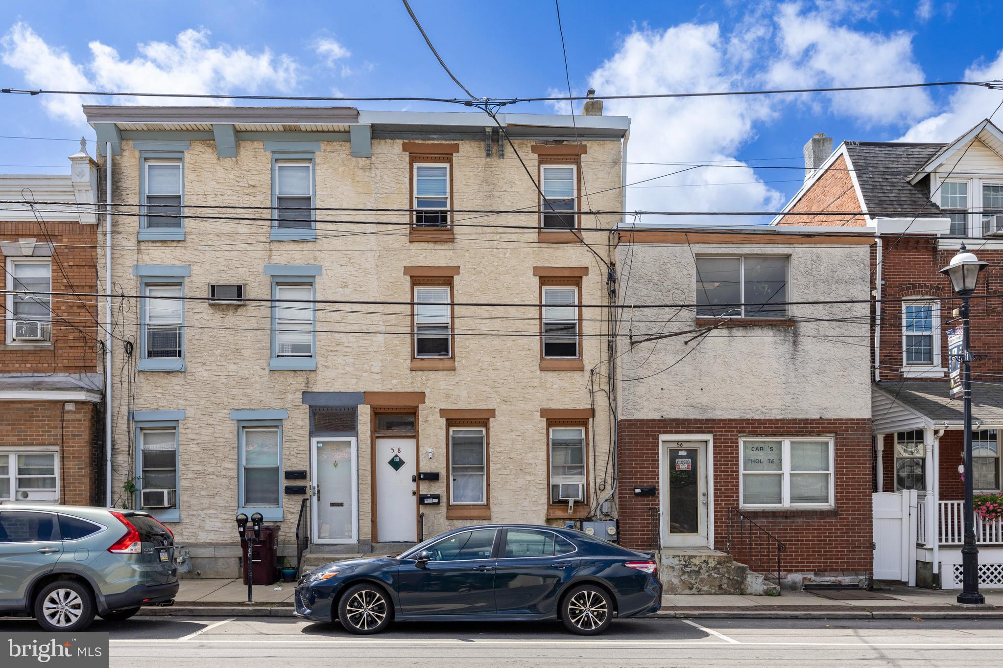 58 East 4th Street, Unit 2 Bridgeport, PA 19405 - Photo 26 of 28 a car parked in front of a building