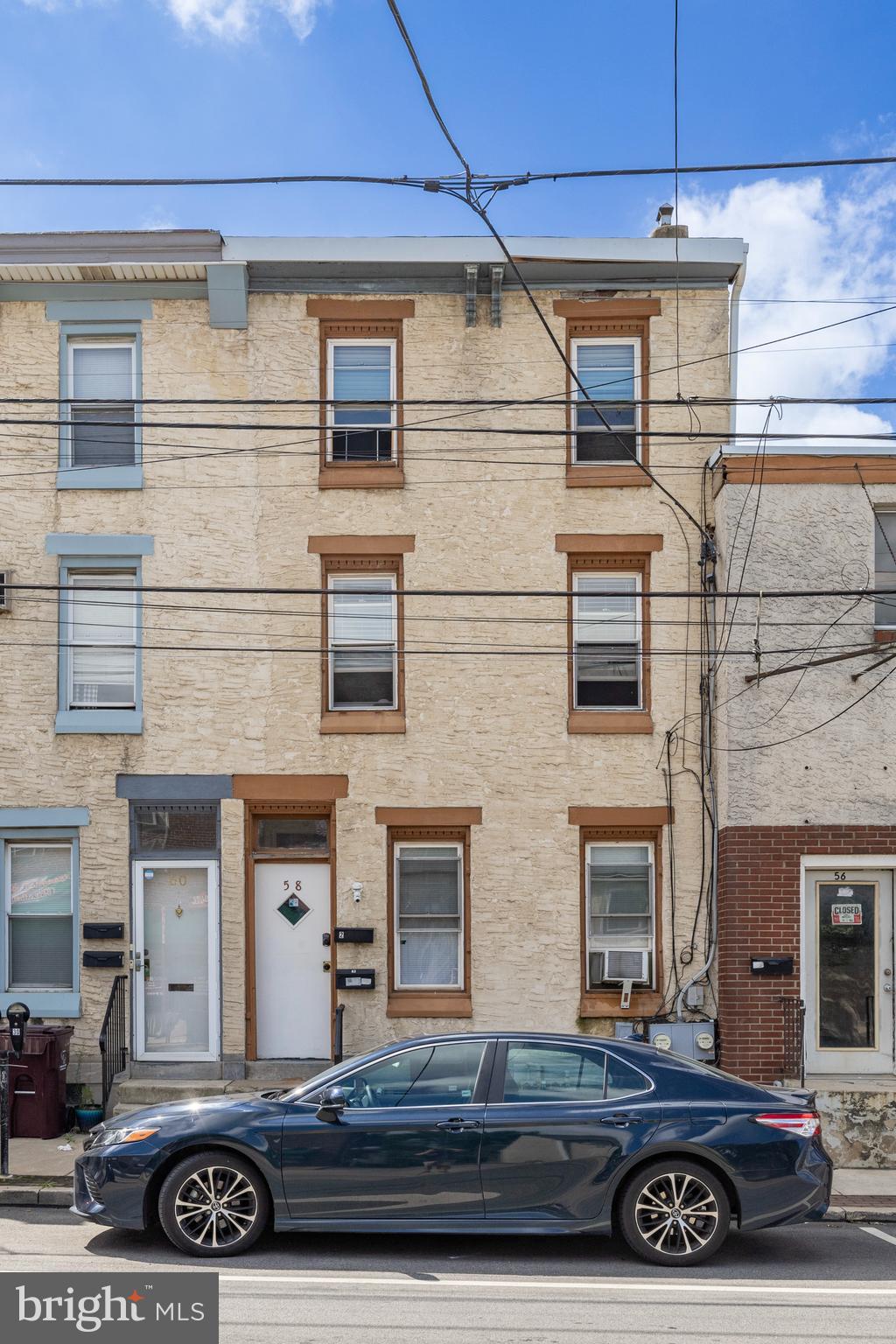 58 East 4th Street, Unit 2 Bridgeport, PA 19405 - Photo 27 of 28 a front view of a house with parking space