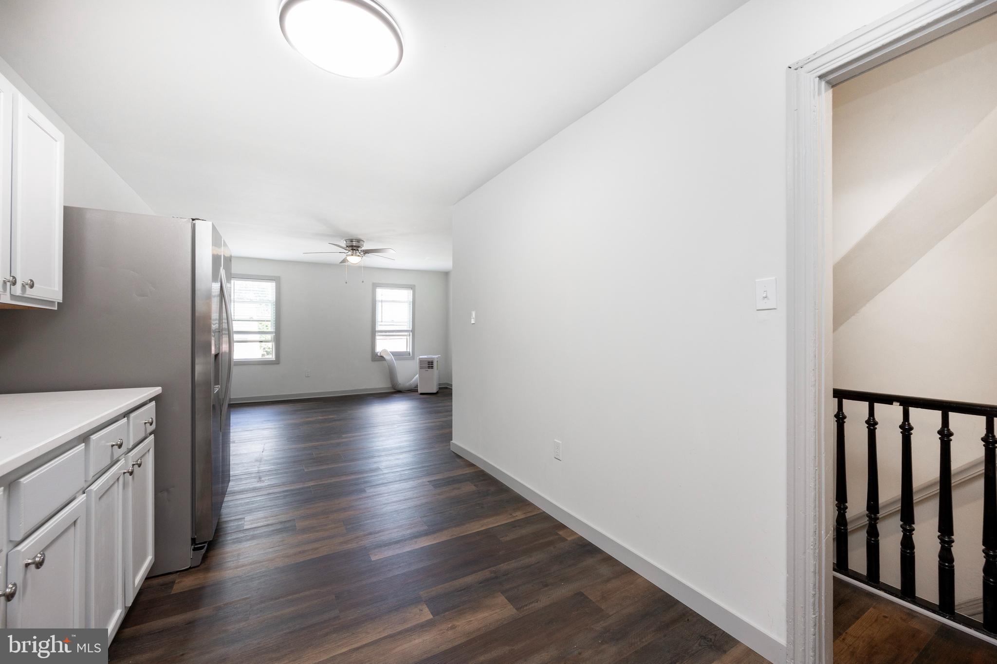 58 East 4th Street, Unit 2 Bridgeport, PA 19405 - Photo 4 of 28 a view of entryway with stairs and wooden floor