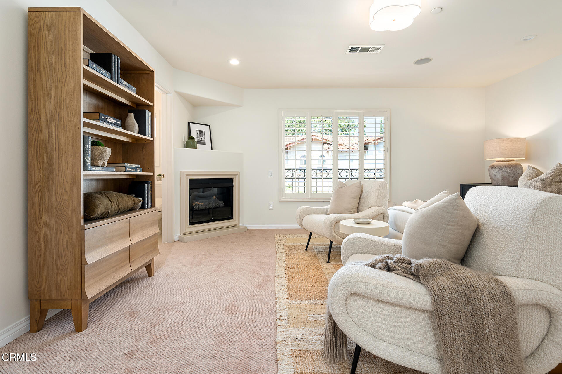 332 Allendale Road, Unit 2 Pasadena, CA 91106 - Photo 16 of 28 a living room with furniture a window and a fireplace