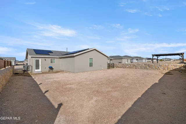 a view of house with yard
