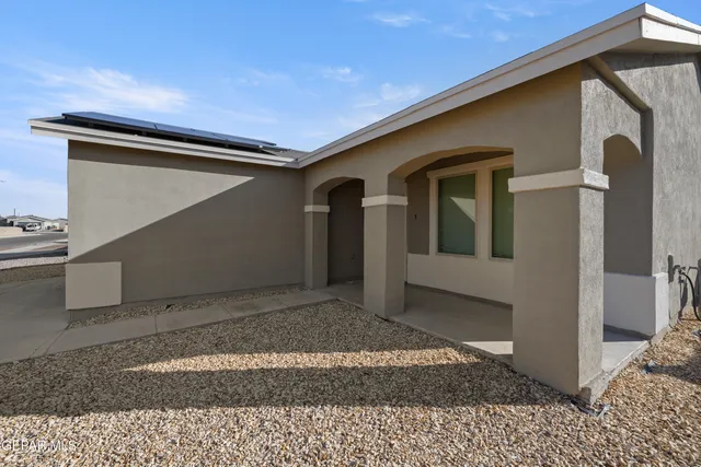 a house view with a backyard space
