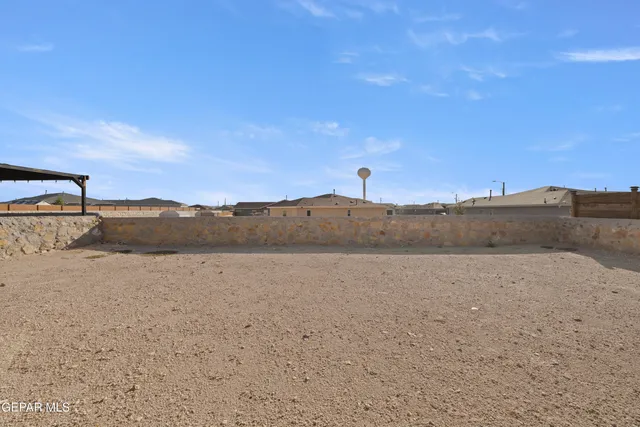 a view of ocean beach and mountain