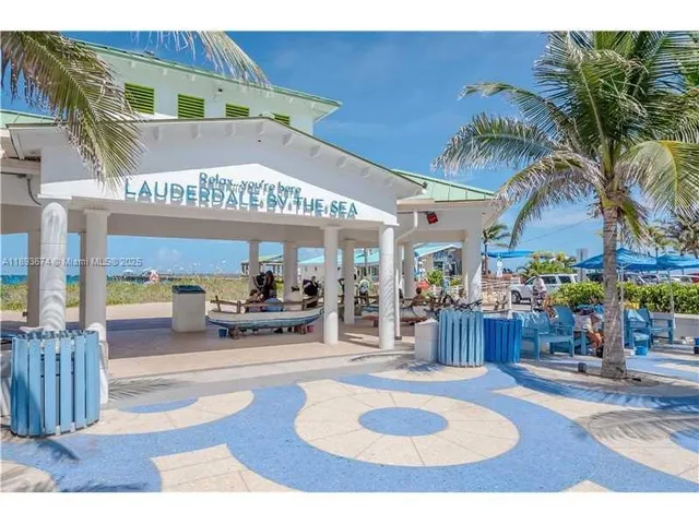 a view of a chairs and table in the patio