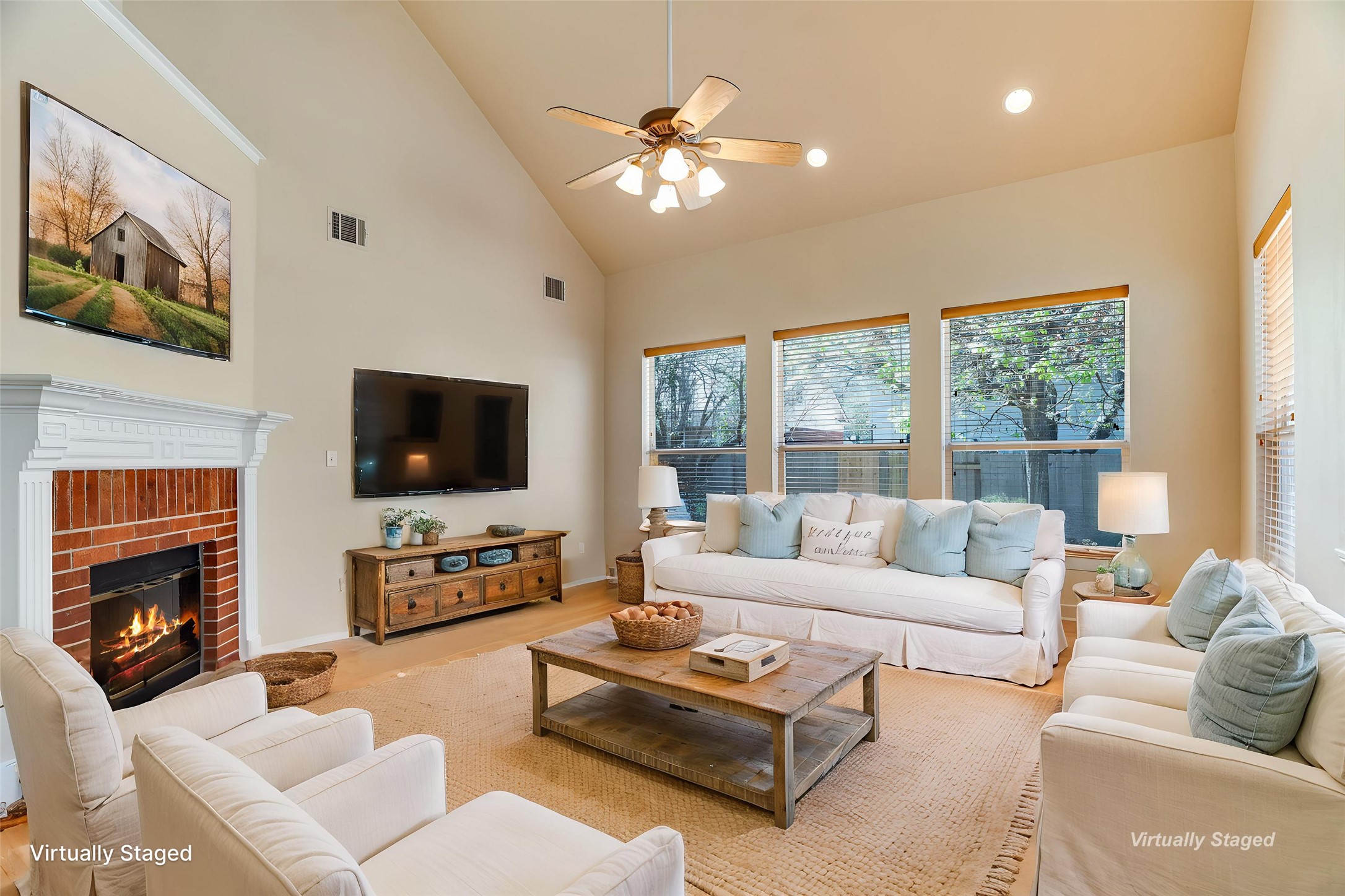 2207 Clover Ridge Drive Cedar Park, TX 78613 - Photo 4 of 25 Living room with high ceiling and a fireplace virtually staged