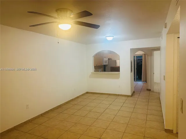 a view of an empty room and window