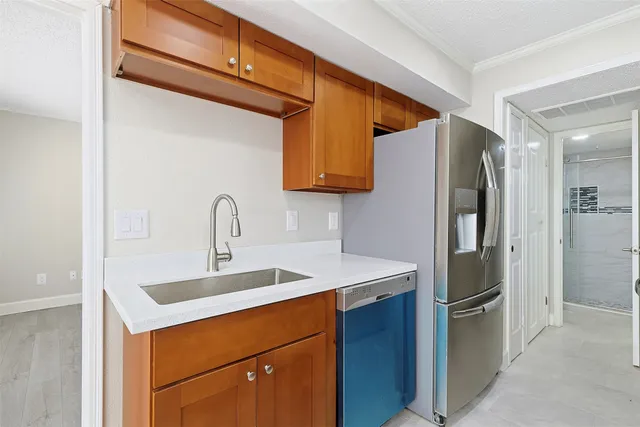 a kitchen with a stove and a microwave