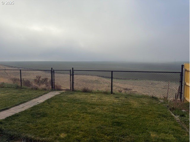 2796 High Desert Loop Umatilla, OR 97882 - Photo 18 of 19 a view of a yard with an outdoor space