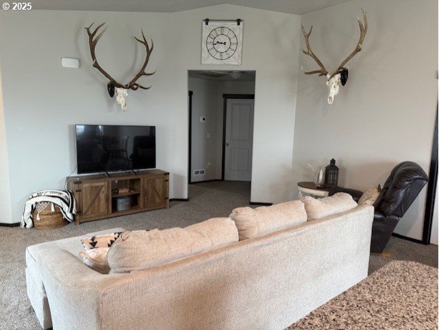 2796 High Desert Loop Umatilla, OR 97882 - Photo 3 of 19 a living room with furniture and a flat screen tv