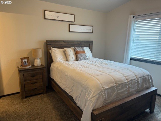 2796 High Desert Loop Umatilla, OR 97882 - Photo 7 of 19 a bed sitting in a bedroom next to a window