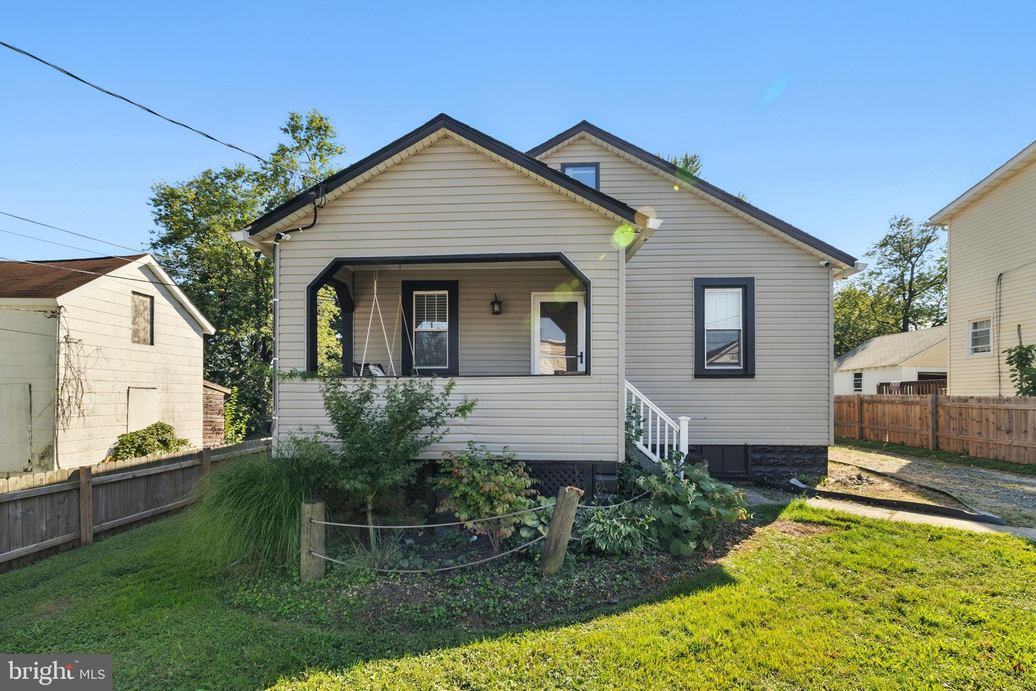 361 Savannah Road Baltimore, MD 21221 - Photo 2 of 30 a front view of a house with garden