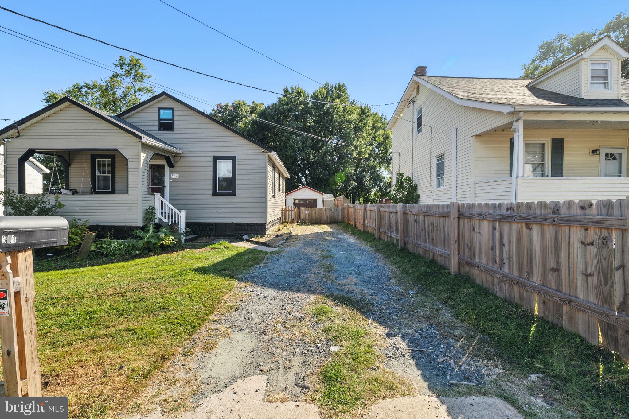 361 Savannah Road Baltimore, MD 21221 - Photo 26 of 30 a front view of a house with garden