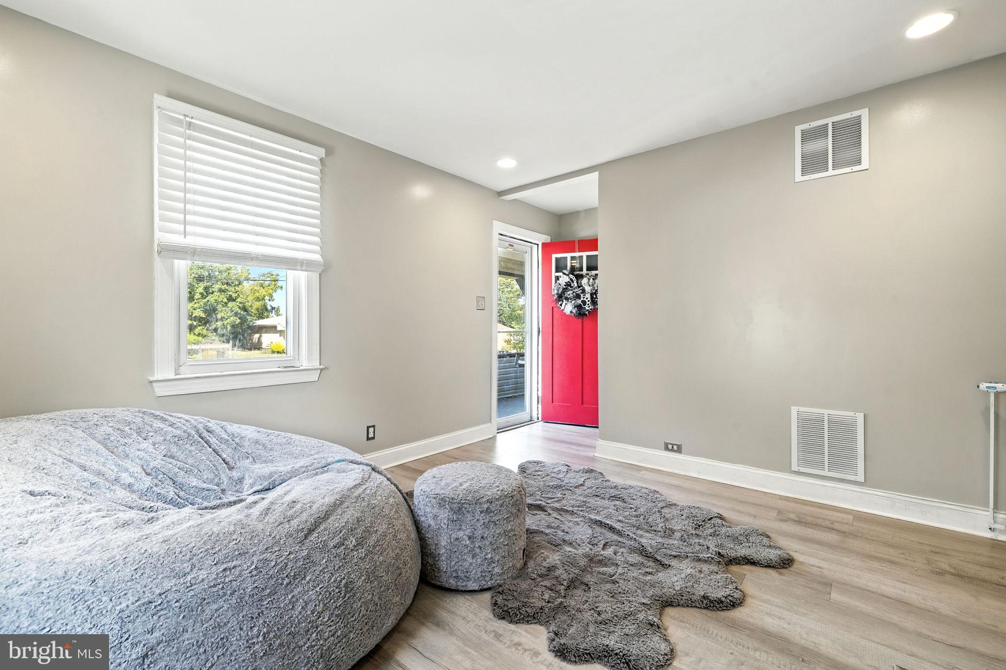 361 Savannah Road Baltimore, MD 21221 - Photo 5 of 30 a bedroom with a bed and a window