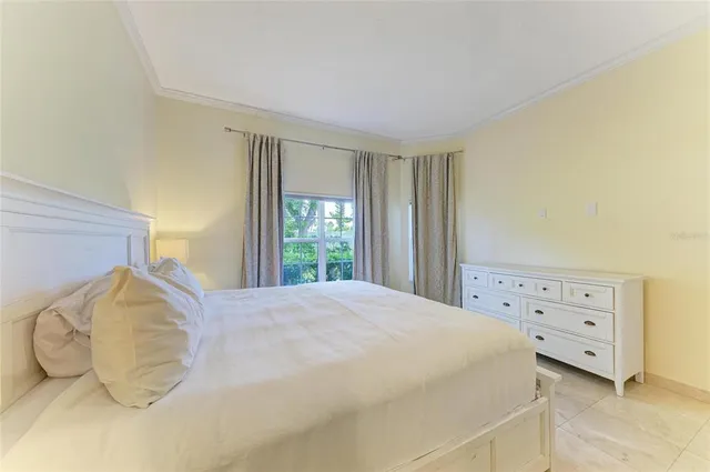 a bathroom with a double vanity sink mirror double and a bathtub