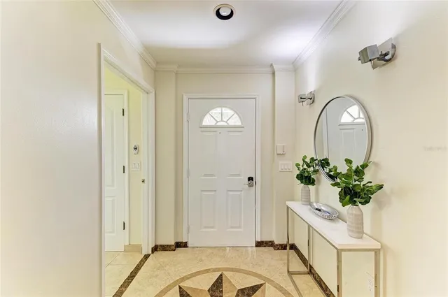 a room with a sink and a mirror