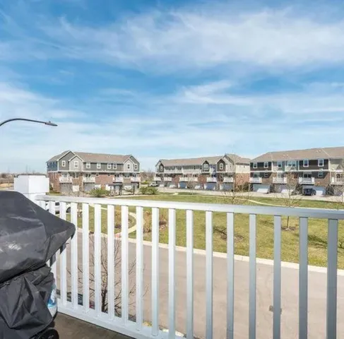 a view of a city from a balcony