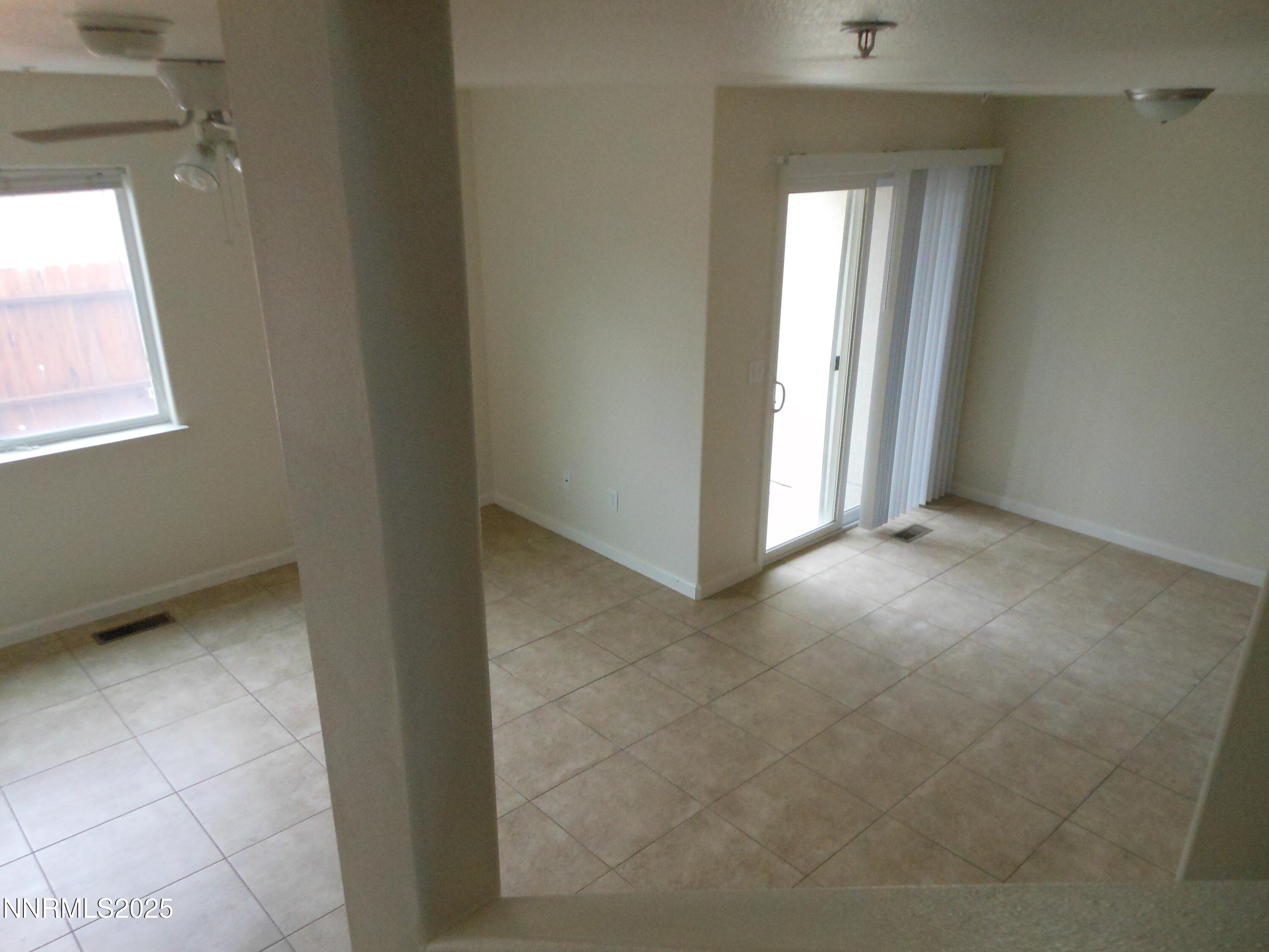 655 Desert Springs Court Fallon, NV 89406 - Photo 16 of 16 an empty room that has a window