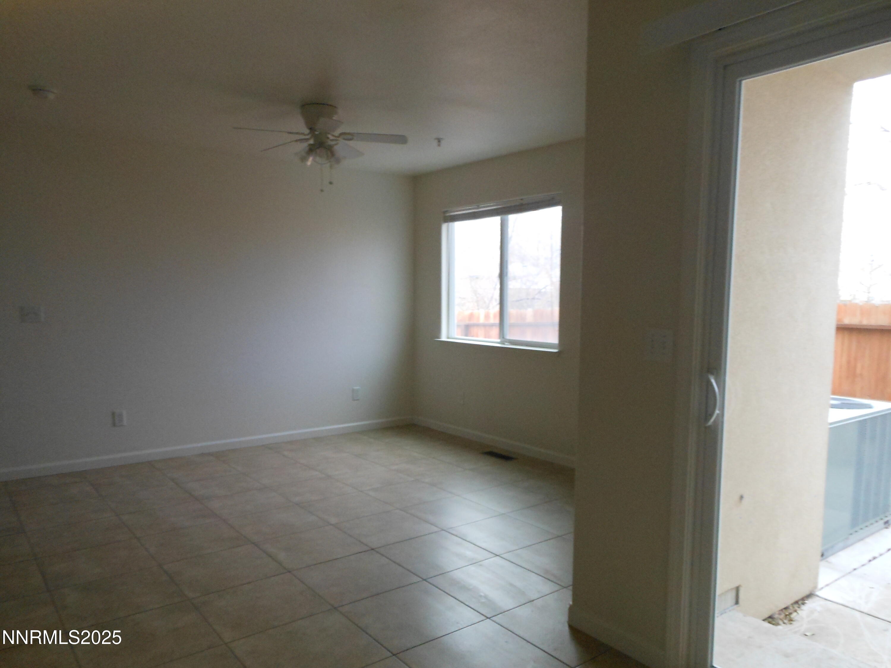 655 Desert Springs Court Fallon, NV 89406 - Photo 3 of 16 an empty room with windows