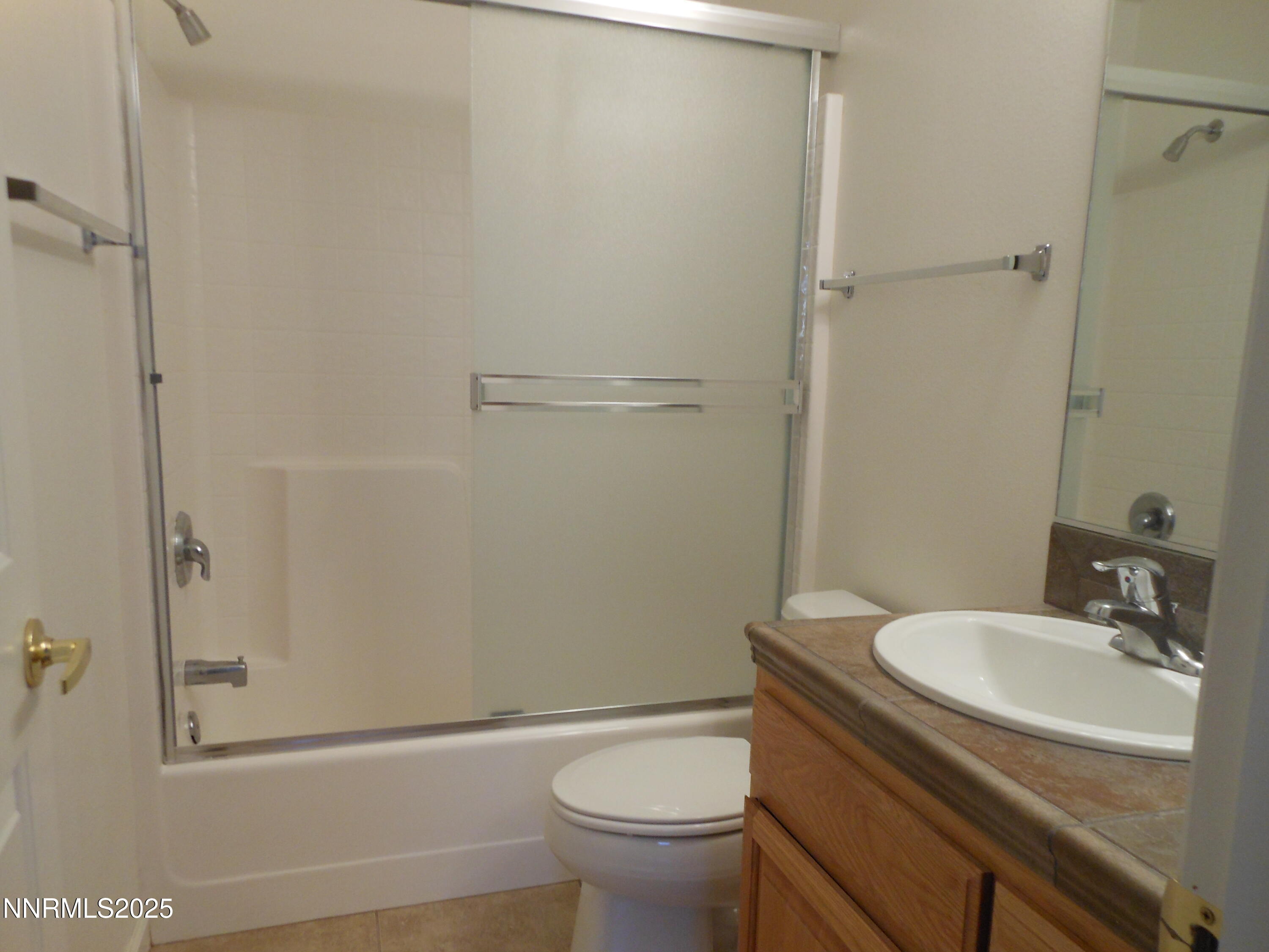 655 Desert Springs Court Fallon, NV 89406 - Photo 8 of 16 a bathroom with a sink toilet and shower