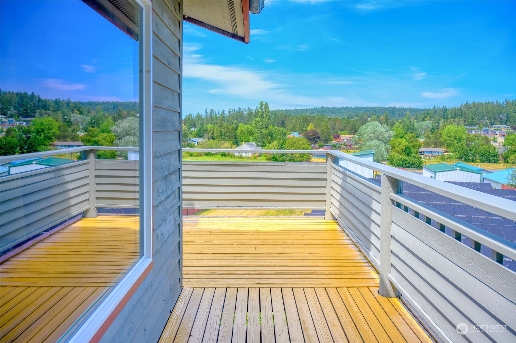 720 Guard Street, Unit 4 Friday Harbor, WA 98250 - Photo 17 of 19 a view of balcony with two chairs