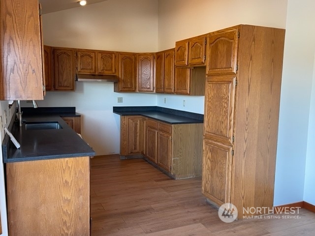 720 Guard Street, Unit 4 Friday Harbor, WA 98250 - Photo 4 of 19 a kitchen with stainless steel appliances a refrigerator and a stove