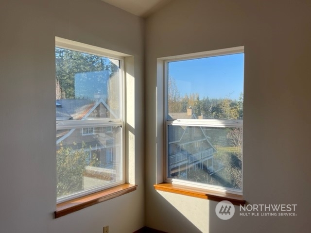 720 Guard Street, Unit 4 Friday Harbor, WA 98250 - Photo 8 of 19 a view of a glass door with a glass door
