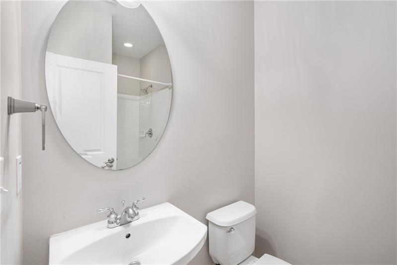 1420 Briarhaven Trail Atlanta, GA 30319 - Photo 24 of 29 a bathroom with a toilet sink and mirror