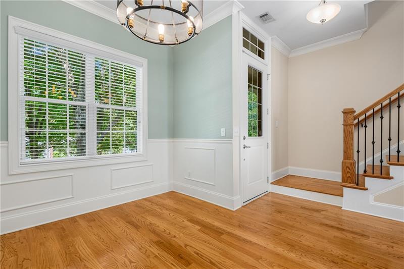 1420 Briarhaven Trail Atlanta, GA 30319 - Photo 4 of 29 a view of an empty room with wooden floor and a window