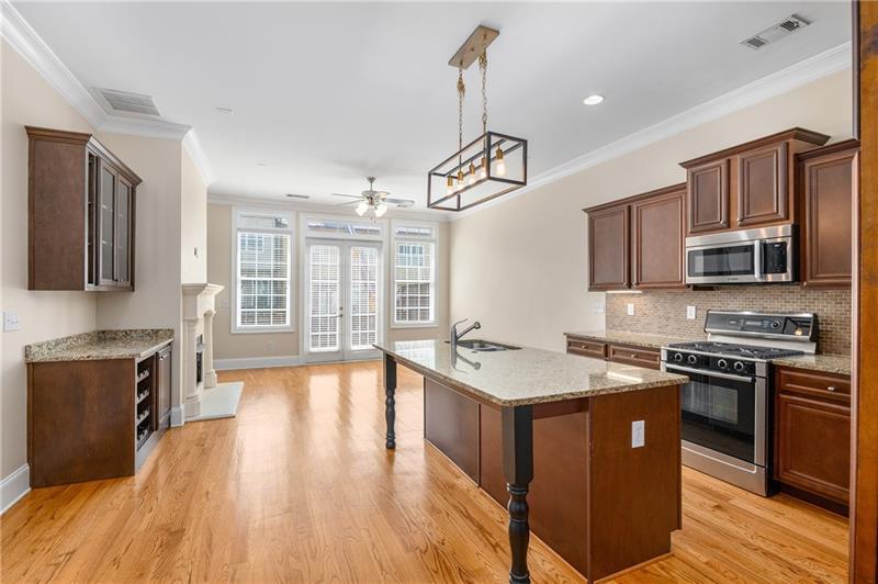 1420 Briarhaven Trail Atlanta, GA 30319 - Photo 5 of 29 a kitchen with stainless steel appliances granite countertop a sink stove and refrigerator