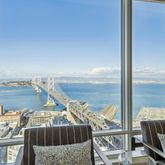 a view of a balcony with furniture