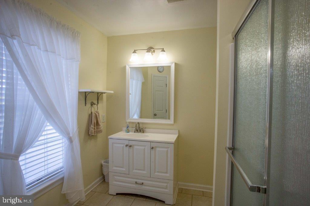 661 Stemmers Run Road Earleville, MD 21919 - Photo 17 of 42 Primary Bath-Ceramic Tile PLUS Main Level Laundry