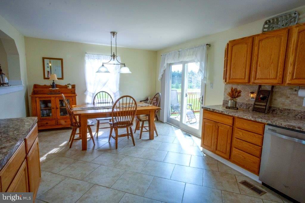 661 Stemmers Run Road Earleville, MD 21919 - Photo 8 of 42 Spacious Eat-In Kitchen with Striking Ceramic Tile