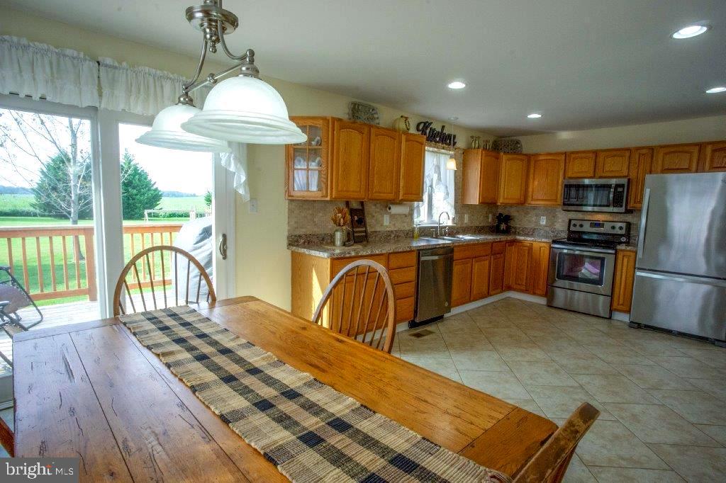 661 Stemmers Run Road Earleville, MD 21919 - Photo 9 of 42 Sliders lead to Deck-Perfect for Entertaining!