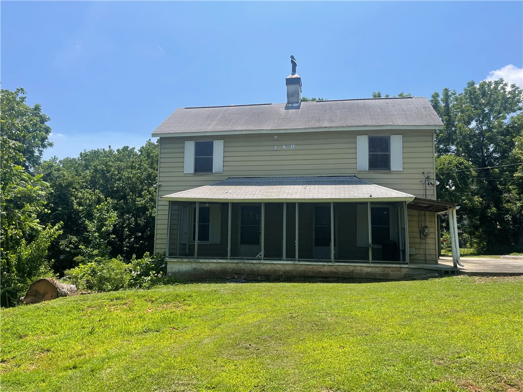 171 River Ridge Road Seneca, SC 29672 - Photo 19 of 22 A classic facade with a welcoming screened porch awaits its next chapter.