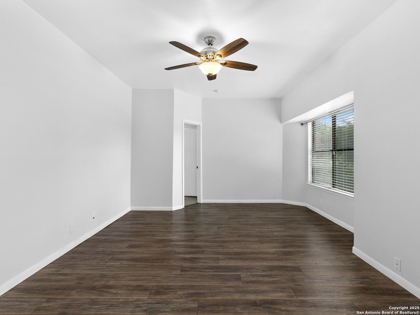 5430 Vista Court San Antonio, TX 78247 - Photo 21 of 37 a view of an empty room with wooden floor and a window