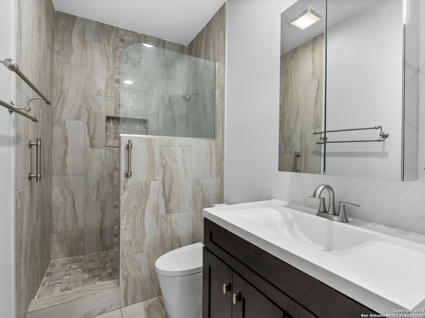 5430 Vista Court San Antonio, TX 78247 - Photo 27 of 37 a bathroom with a sink and a mirror