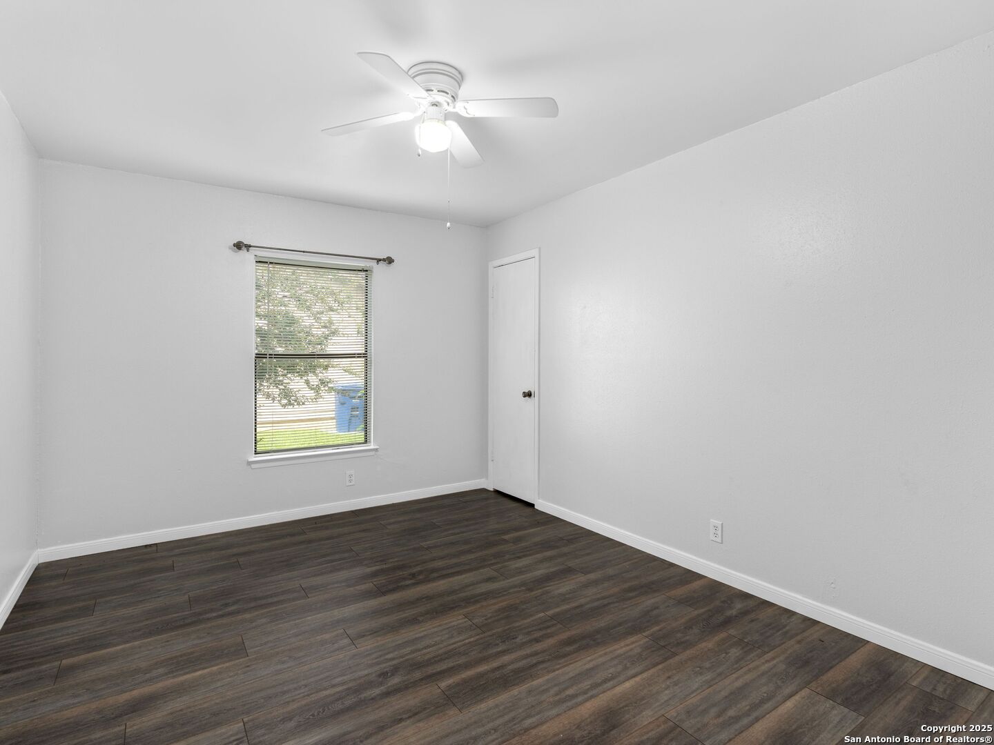 5430 Vista Court San Antonio, TX 78247 - Photo 31 of 37 wooden floor in an empty room with a window