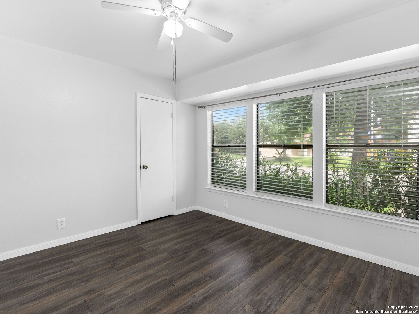 5430 Vista Court San Antonio, TX 78247 - Photo 32 of 37 a view of an empty room with wooden floor and a window