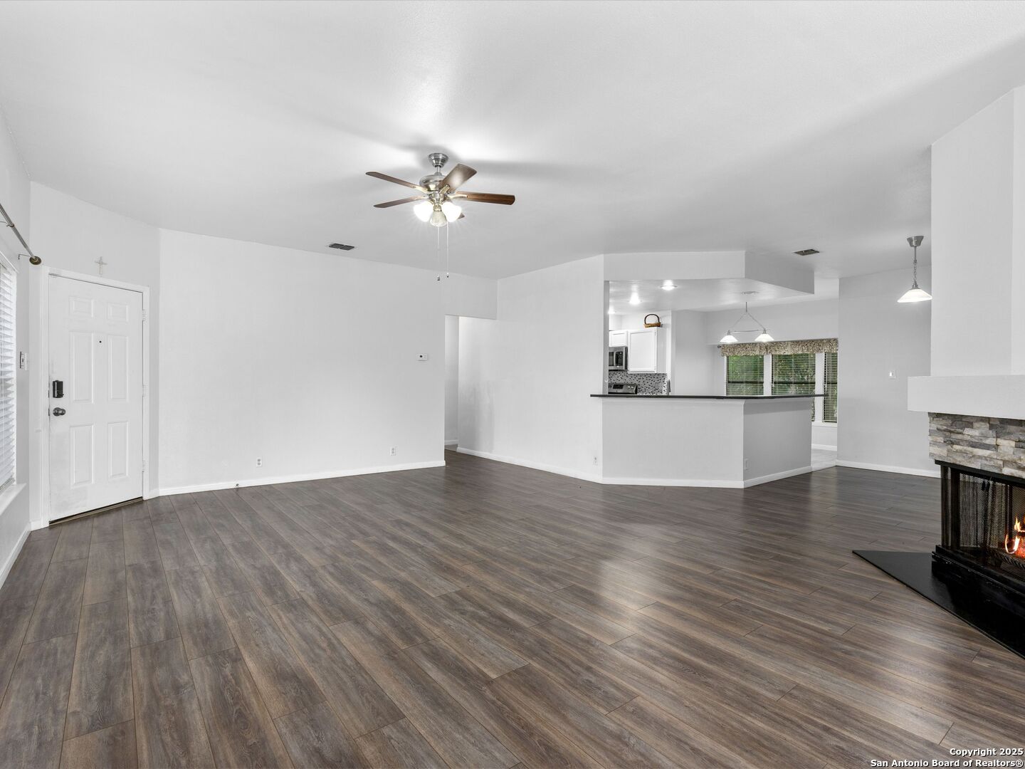 5430 Vista Court San Antonio, TX 78247 - Photo 5 of 37 a view of a kitchen with wooden floor and a kitchen